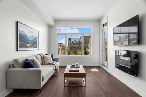 411-28 Auburn Bay Link Se, Calgary, AB - Indoor Photo Showing Living Room