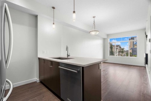 411-28 Auburn Bay Link Se, Calgary, AB - Indoor Photo Showing Kitchen With Double Sink