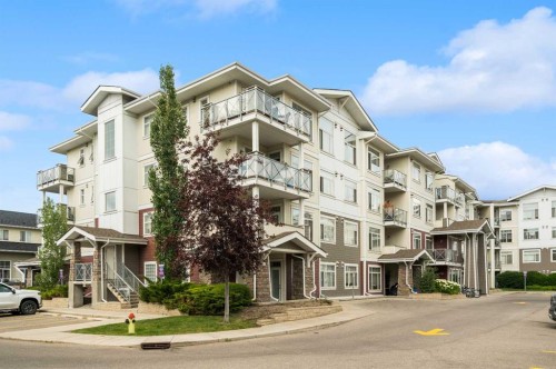 411-28 Auburn Bay Link Se, Calgary, AB - Outdoor With Balcony With Facade