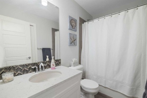 153 Sandstone Drive, Okotoks, AB - Indoor Photo Showing Bathroom