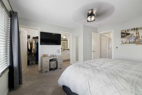 153 Sandstone Drive, Okotoks, AB - Indoor Photo Showing Bedroom
