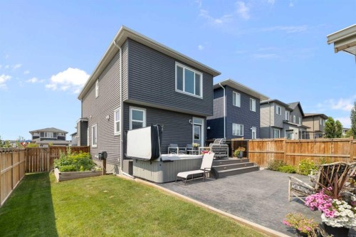 153 Sandstone Drive, Okotoks, AB - Outdoor With Deck Patio Veranda
