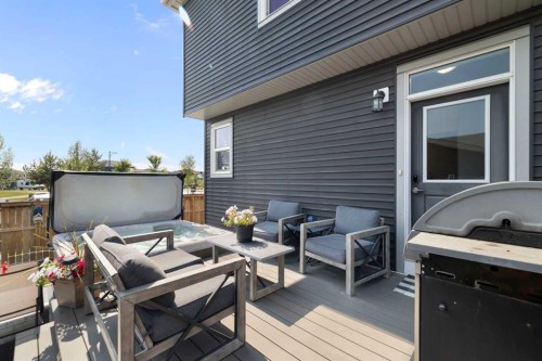 153 Sandstone Drive, Okotoks, AB - Outdoor With Deck Patio Veranda With Exterior