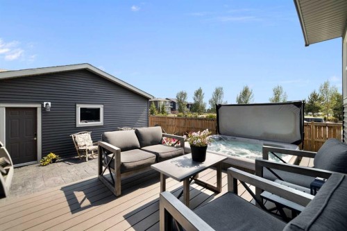 153 Sandstone Drive, Okotoks, AB - Outdoor With Deck Patio Veranda With Exterior