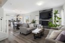 153 Sandstone Drive, Okotoks, AB  - Indoor Photo Showing Living Room With Fireplace 