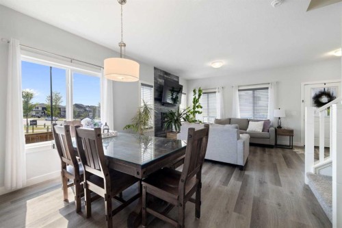 153 Sandstone Drive, Okotoks, AB - Indoor With Fireplace