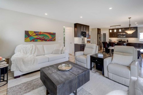 8 Canoe Road Sw, Airdrie, AB - Indoor Photo Showing Living Room