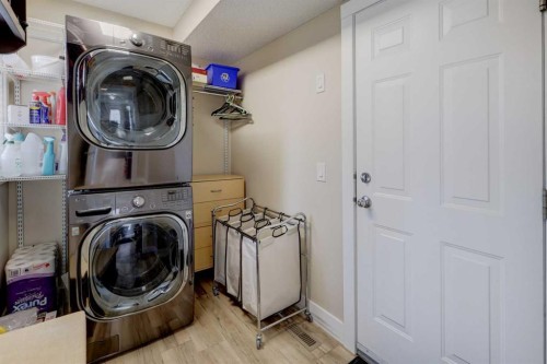 8 Canoe Road Sw, Airdrie, AB - Indoor Photo Showing Laundry Room