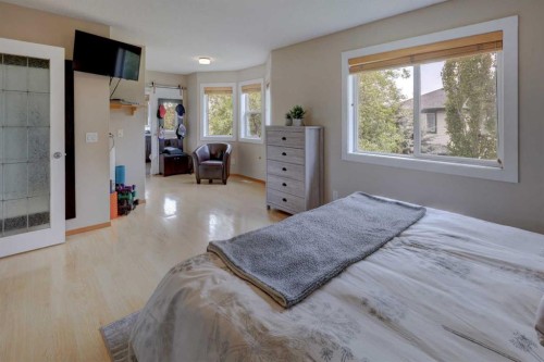 8 Canoe Road Sw, Airdrie, AB - Indoor Photo Showing Bedroom