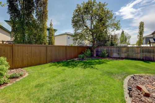 8 Canoe Road Sw, Airdrie, AB - Outdoor With Backyard