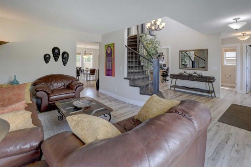 8 Canoe Road Sw, Airdrie, AB - Indoor Photo Showing Living Room