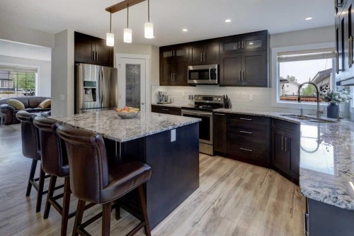 8 Canoe Road Sw, Airdrie, AB - Indoor Photo Showing Kitchen With Stainless Steel Kitchen With Upgraded Kitchen