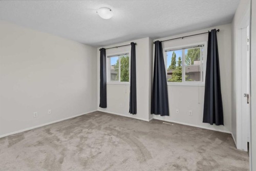 34 Eversyde Common Sw, Calgary, AB - Indoor Photo Showing Other Room