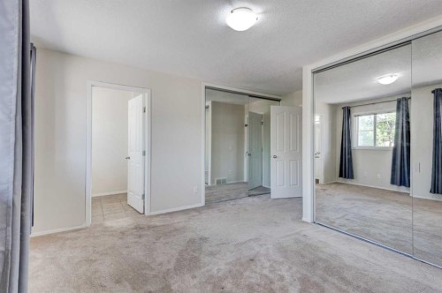 34 Eversyde Common Sw, Calgary, AB - Indoor Photo Showing Other Room