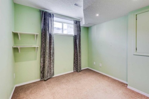 34 Eversyde Common Sw, Calgary, AB - Indoor Photo Showing Other Room
