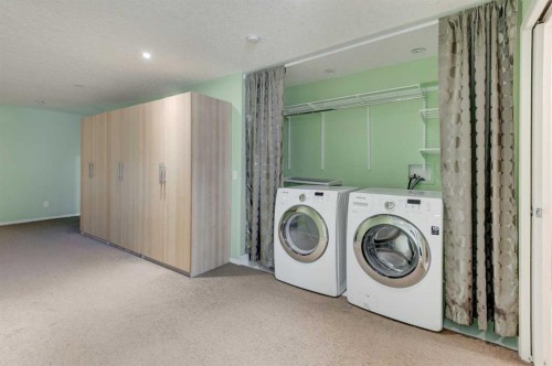 34 Eversyde Common Sw, Calgary, AB - Indoor Photo Showing Laundry Room