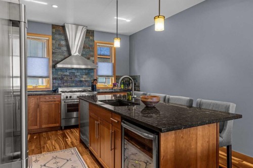 8-511 6Th Avenue, Canmore, AB - Indoor Photo Showing Kitchen With Double Sink