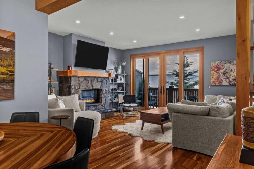 8-511 6Th Avenue, Canmore, AB - Indoor Photo Showing Living Room With Fireplace
