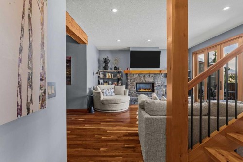 8-511 6Th Avenue, Canmore, AB - Indoor Photo Showing Other Room With Fireplace