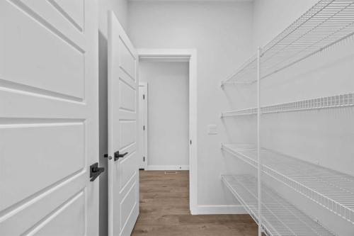 35 Creekside Rise Sw, Calgary, AB - Indoor With Storage