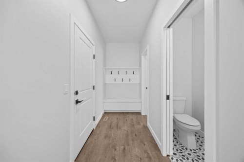 35 Creekside Rise Sw, Calgary, AB - Indoor Photo Showing Other Room