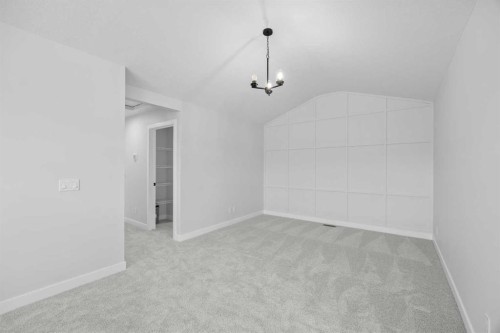 35 Creekside Rise Sw, Calgary, AB - Indoor Photo Showing Other Room
