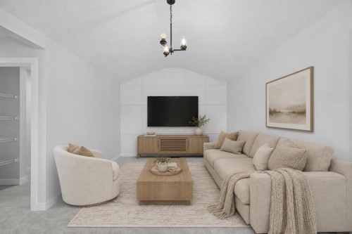 35 Creekside Rise Sw, Calgary, AB - Indoor Photo Showing Living Room