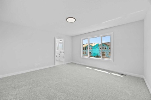 35 Creekside Rise Sw, Calgary, AB - Indoor Photo Showing Other Room