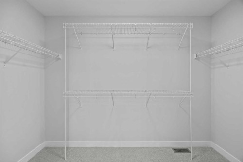 35 Creekside Rise Sw, Calgary, AB - Indoor With Storage