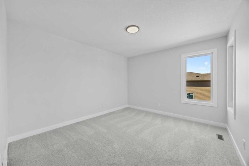 35 Creekside Rise Sw, Calgary, AB - Indoor Photo Showing Other Room