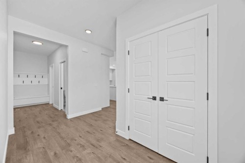 35 Creekside Rise Sw, Calgary, AB - Indoor Photo Showing Other Room