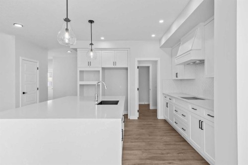 35 Creekside Rise Sw, Calgary, AB - Indoor Photo Showing Kitchen With Upgraded Kitchen