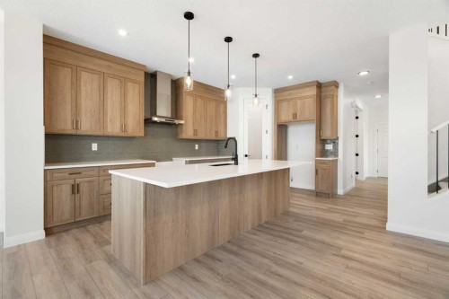 331 Rivercrest Road, Cochrane, AB - Indoor Photo Showing Kitchen With Upgraded Kitchen