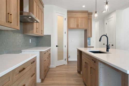 331 Rivercrest Road, Cochrane, AB - Indoor Photo Showing Kitchen With Upgraded Kitchen