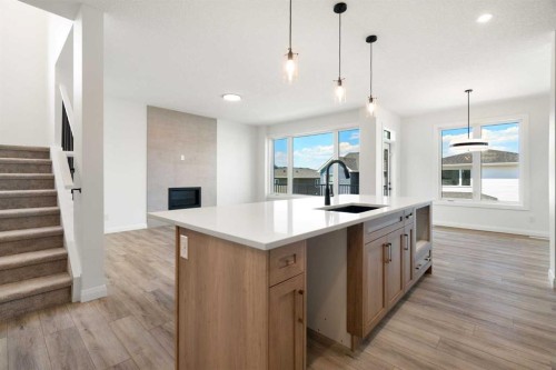 331 Rivercrest Road, Cochrane, AB - Indoor Photo Showing Kitchen With Upgraded Kitchen