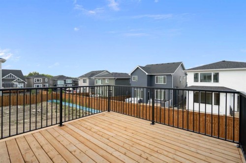 331 Rivercrest Road, Cochrane, AB - Outdoor With Deck Patio Veranda With Exterior