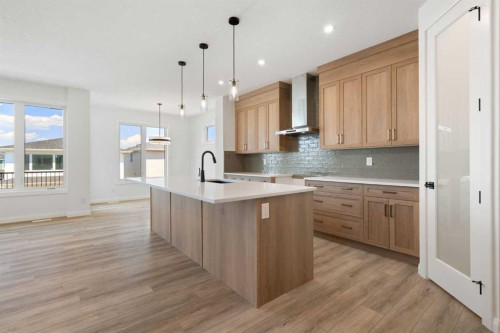 331 Rivercrest Road, Cochrane, AB - Indoor Photo Showing Kitchen With Upgraded Kitchen