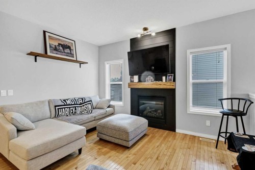 738 Carriage Lane Drive, Carstairs, AB - Indoor Photo Showing Living Room With Fireplace