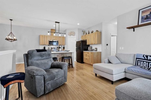 738 Carriage Lane Drive, Carstairs, AB - Indoor Photo Showing Living Room