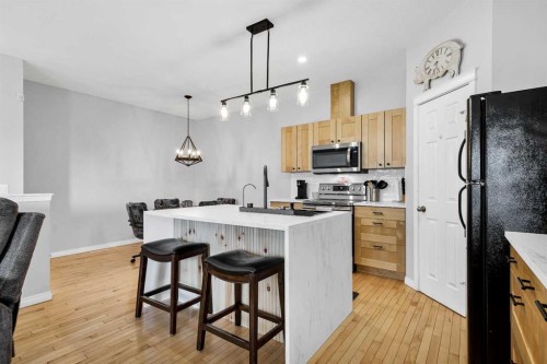 738 Carriage Lane Drive, Carstairs, AB - Indoor Photo Showing Kitchen
