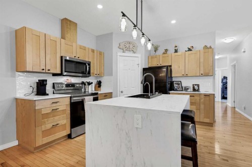 738 Carriage Lane Drive, Carstairs, AB - Indoor Photo Showing Kitchen