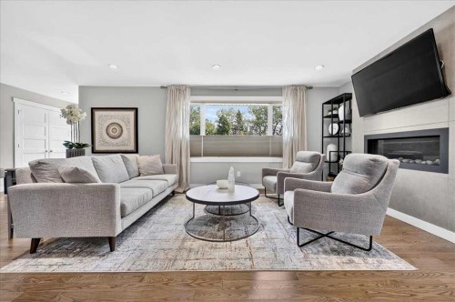 10807 Mapleshire Crescent Se, Calgary, AB - Indoor Photo Showing Living Room With Fireplace