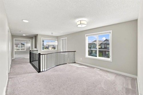11 Savanna Villas Ne, Calgary, AB - Indoor Photo Showing Other Room
