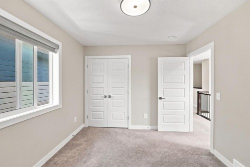 11 Savanna Villas Ne, Calgary, AB - Indoor Photo Showing Other Room