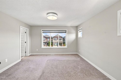 11 Savanna Villas Ne, Calgary, AB - Indoor Photo Showing Other Room