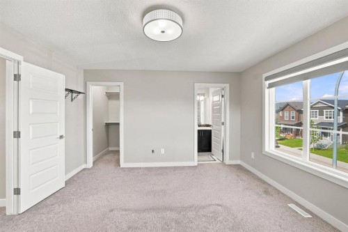 11 Savanna Villas Ne, Calgary, AB - Indoor Photo Showing Other Room