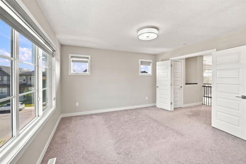 11 Savanna Villas Ne, Calgary, AB - Indoor Photo Showing Other Room
