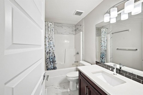 11 Savanna Villas Ne, Calgary, AB - Indoor Photo Showing Bathroom