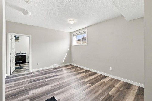 11 Savanna Villas Ne, Calgary, AB - Indoor Photo Showing Other Room