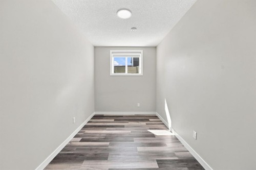 11 Savanna Villas Ne, Calgary, AB - Indoor Photo Showing Other Room
